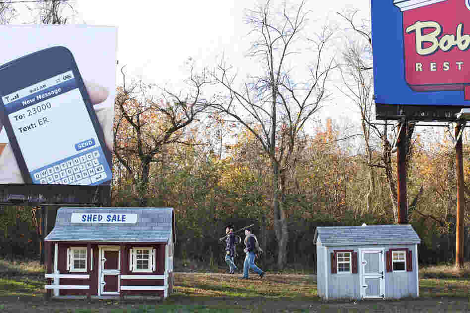 Brent Feito and Lars Prillaman walk through a place where Union campsites were established during the winter of 1862-63, in Stafford County, Va.