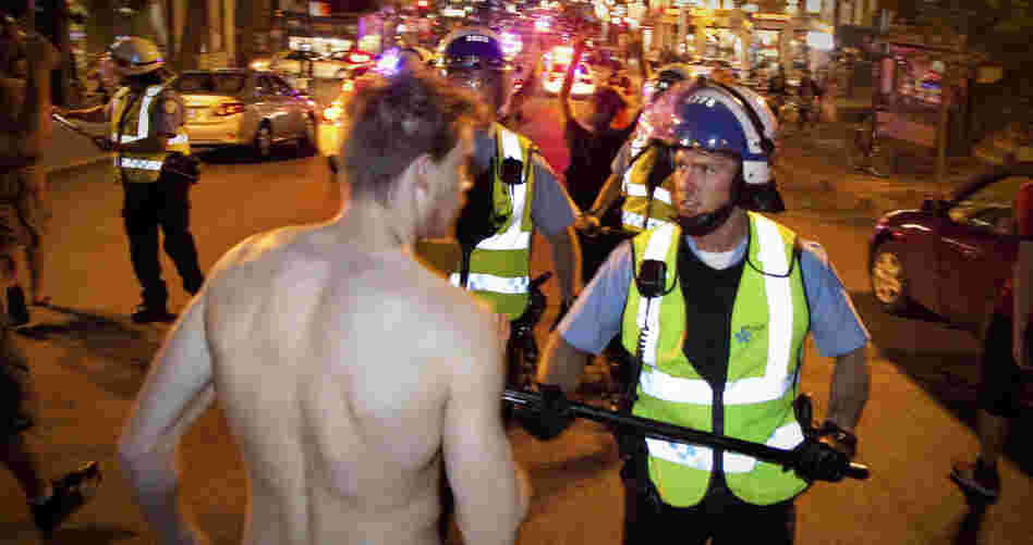 Montreal police and protesters face off on Wednesday during a demonstration against student tuition hikes.