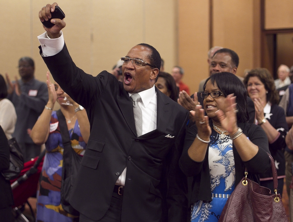 Dr. Patrick Wooden, senior pastor of the Upper Room Church of God In Christ in North Carolina, celebrates early returns that show strong support for Amendment One, which bans gay marriage in the state.