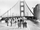 More than 200,000 people crossed the bridge the day it opened in 1937. Many walked. Others ran, tap-danced, roller-skated, unicycled, or strode on stilts. More than 200,000 people crossed the bridge the day it opened in 1937. Many walked. Others ran, tap-danced, roller-skated, unicycled, or strode on stilts.