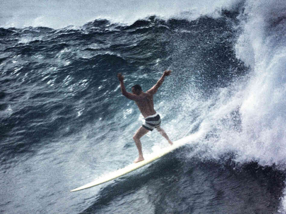 Greg Noll surfing Waimea Bay in Oahu in 1960.