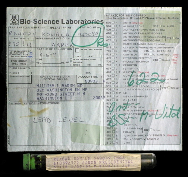 The vial that its owner claims contains some of President Reagan's blood, along with some of the paperwork.