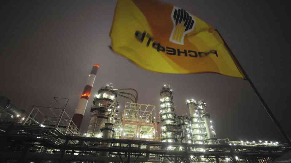 A Rosneft flag flies over the Russian oil giant's refinery near the city of Samara. Growth of Russia's oil and gas output has stalled, but Exxon Mobil and other foreign firms have signed deals to help exploit the Arctic. A Rosneft flag flies over the Russian oil giant's refinery near the city of Samara. Growth of Russia's oil and gas output has stalled, but Exxon Mobil and other foreign firms have signed deals to help exploit the Arctic.