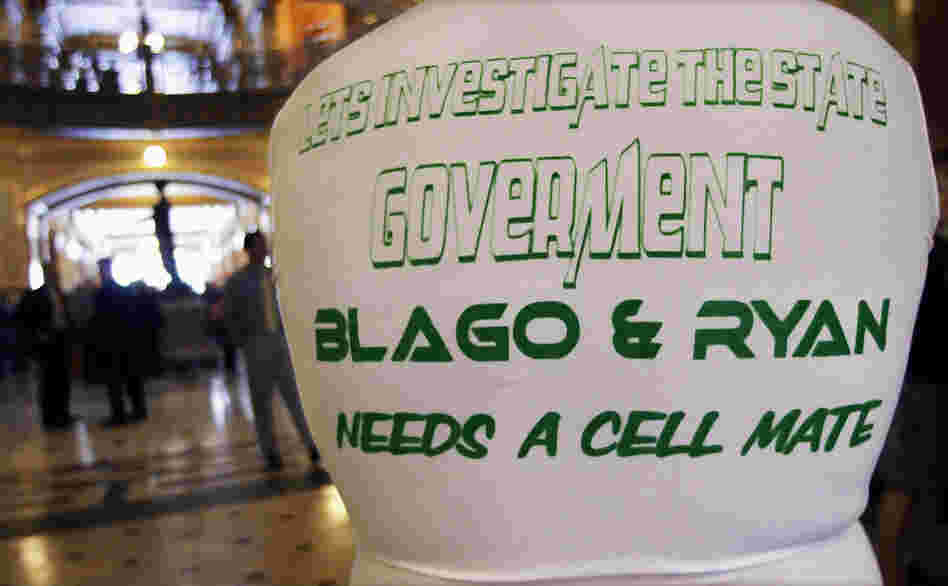 Despite the misspelling and grammar error, the tee-shirt message is clear on a protester at the Illinois capitol on May 16, 2012. It cites two former governors now in federal prison for corruption.