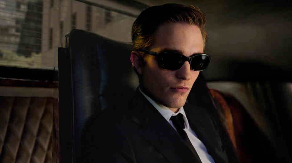 Robert Pattinson as Eric Packer in Cosmopolis. Robert Pattinson as Eric Packer in Cosmopolis.