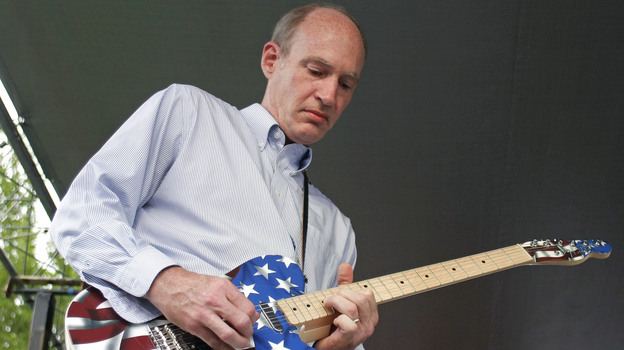 Rep.Thaddeus McCotter, R-Mich., is a regular on Twitter. Here, he plays guitar at a festival last July in Whitmore Lake, Mich.