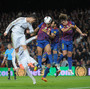 Spain's soccer teams are feeling the crunch of debt, too. But rich, winning teams like Real Madrid and Barcelona — seen here playing in April — are the most likely to stay in the game. Spain's soccer teams are feeling the crunch of debt, too. But rich, winning teams like Real Madrid and Barcelona — seen here playing in April — are the most likely to stay in the game.