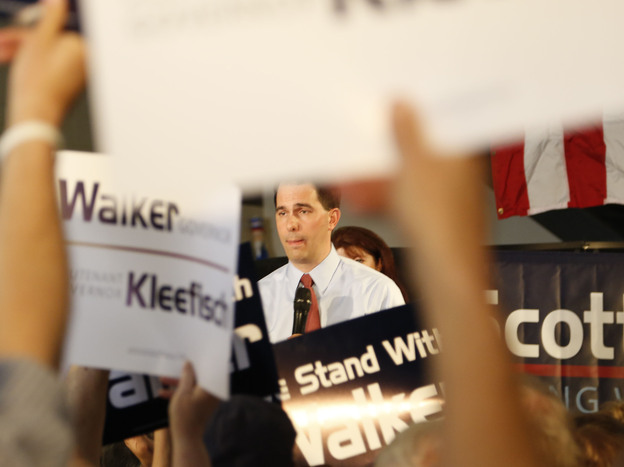 Republican Wisconsin Gov. Scott Walker campaigns Thursday with Louisiana Gov. Bobby Jindal in Waukesha, Wis.