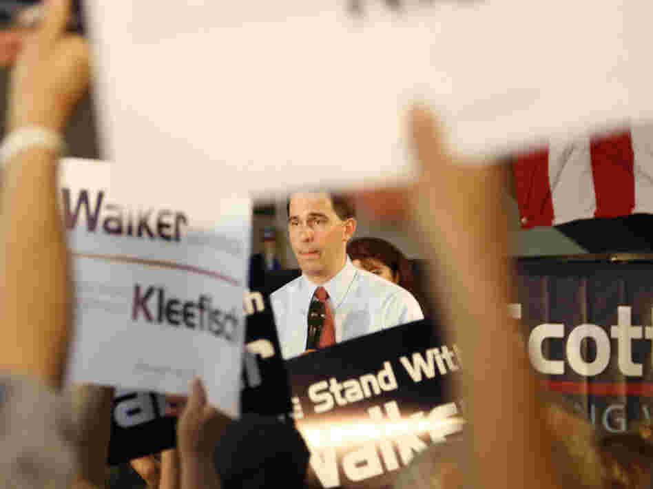Republican Wisconsin Gov. Scott Walker campaigns Thursday with Louisiana Gov. Bobby Jindal in Waukesha, Wis.