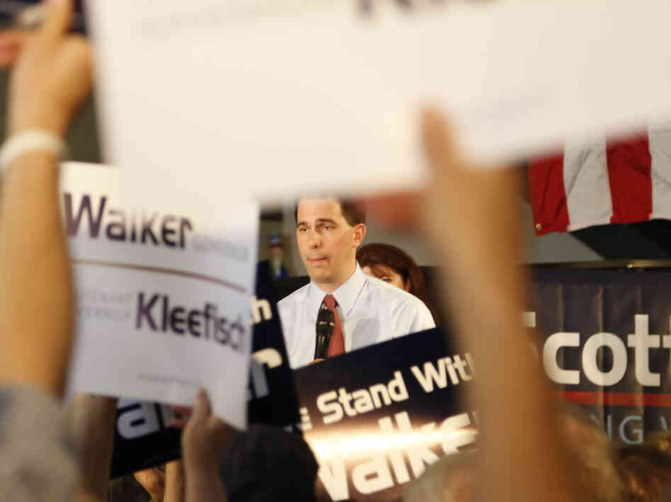 Republican Wisconsin Gov. Scott Walker campaigns Thursday with Louisiana Gov. Bobby Jindal in Waukesha, Wis.