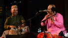 Tabla player and concert organizer Samir Chatterjee plays alongside flutist Ronu Majumdar at Chhandayan's annual all-night concert in New York City in May. Tabla player and concert organizer Samir Chatterjee plays alongside flutist Ronu Majumdar at Chhandayan's annual all-night concert in New York City in May.