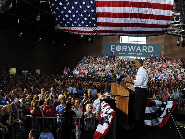 President Obama tossed a cowpie charge at Republican Mitt Romney, Thursday, May 24, 2012, in Des Moines, Iowa.