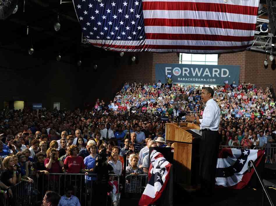 President Obama tossed a cowpie charge at Republican Mitt Romney, Thursday, May 24, 2012, in Des Moines, Iowa.