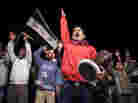 Syrians chant slogans during an anti-regime protest in Qusayr.