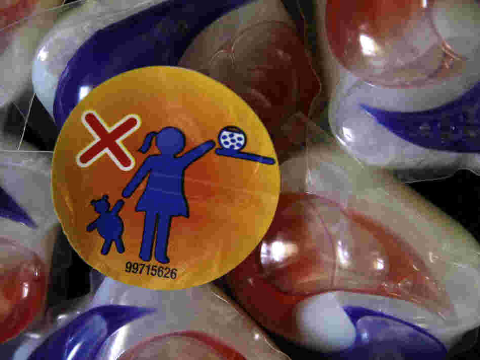 A label on a package of Tide laundry detergent packets warns parents to keep them away from children. Nearly 250 cases of illness from such packets have been reported to poison control centers this year. A label on a package of Tide laundry detergent packets warns parents to keep them away from children. Nearly 250 cases of illness from such packets have been reported to poison control centers this year.
