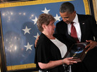 President Obama presents the Medal of Honor to Rose Mary Sabo, widow of Army Spc. Leslie Sabo. Sabo was awarded the nation's highest military decoration posthumously for his actions on May 10, 1970, while serving as a rifleman in Cambodia during the Vietnam War. President Obama presents the Medal of Honor to Rose Mary Sabo, widow of Army Spc. Leslie Sabo. Sabo was awarded the nation's highest military decoration posthumously for his actions on May 10, 1970, while serving as a rifleman in Cambodia during the Vietnam War.