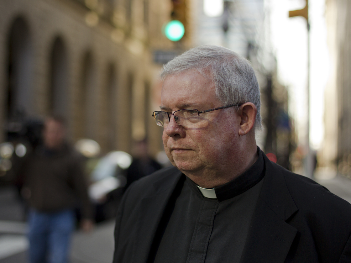 Monsignor William Lynn leaves the Criminal Justice Center in Philadelphia in March. When he finally took to the stand after two months of testimony, the prosecutor called him a liar over and over.