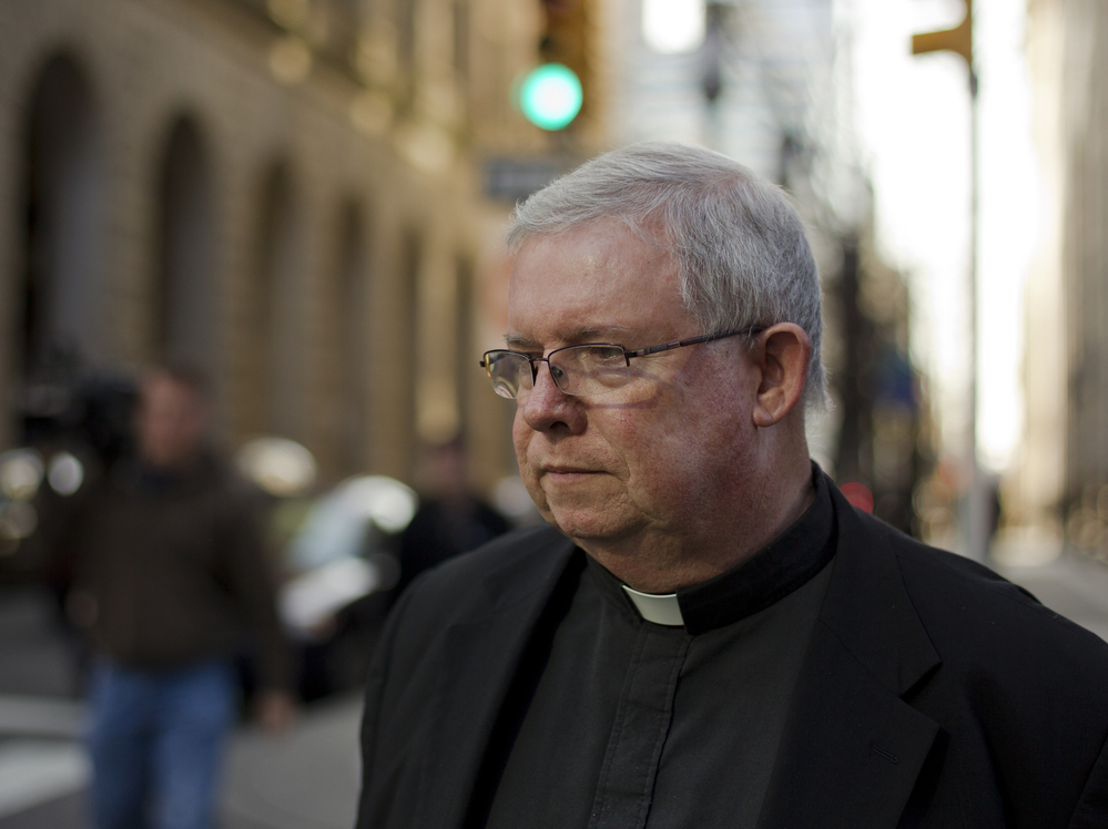 Monsignor William Lynn leaves the Criminal Justice Center in Philadelphia in March. When he finally took to the stand after two months of testimony, the prosecutor called him a liar over and over.