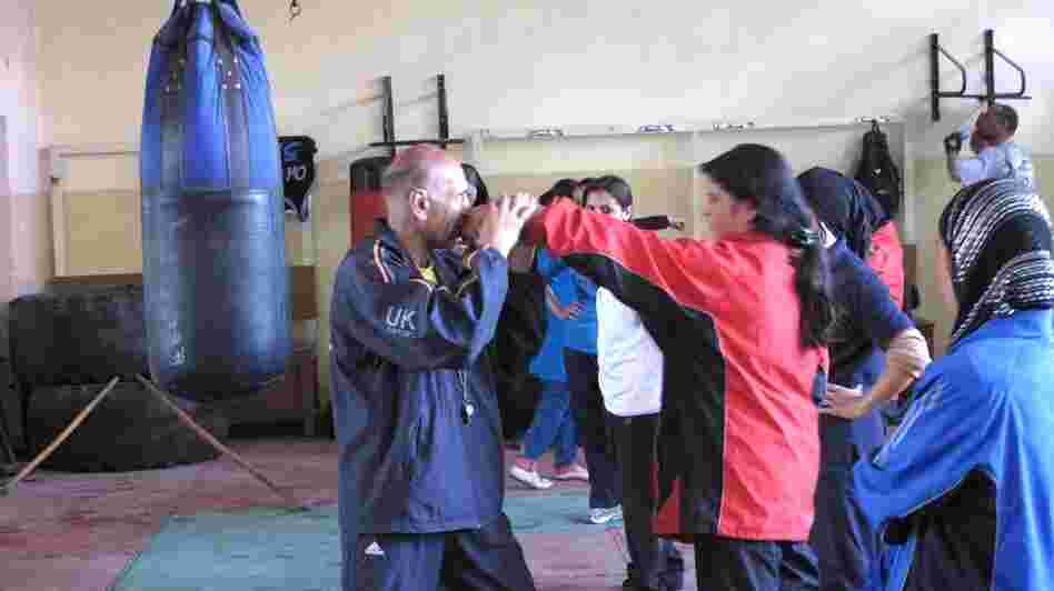 Saber Sharifi has been recruiting and training female boxers in Afghanistan over the past five years. He has often faced resistance from the families of the girls, but there are now 30 boxers on the team, and one will be going to the London Olympics this summer. Saber Sharifi has been recruiting and training female boxers in Afghanistan over the past five years. He has often faced resistance from the families of the girls, but there are now 30 boxers on the team, and one will be going to the London Olympics this summer.