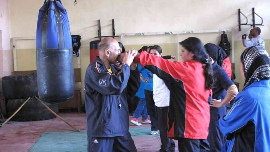 Saber Sharifi has been recruiting and training female boxers in Afghanistan over the past five years. He has often faced resistance from the families of the girls, but there are now 30 boxers on the team, and one will be going to the London Olympics this summer. Saber Sharifi has been recruiting and training female boxers in Afghanistan over the past five years. He has often faced resistance from the families of the girls, but there are now 30 boxers on the team, and one will be going to the London Olympics this summer.