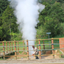 A local resident entertains visitors to the Kawah Kamojang geothermal field in West Java. He puts a length of bamboo to the steam coming from the ground to make a whistle, then throws soda cans into the vent, which shoots them high into the air. The Dutch colonial government drilled Indonesia's first geothermal wells at Kamojang in 1926, when the country was still known as the Dutch East Indies. A local resident entertains visitors to the Kawah Kamojang geothermal field in West Java. He puts a length of bamboo to the steam coming from the ground to make a whistle, then throws soda cans into the vent, which shoots them high into the air. The Dutch colonial government drilled Indonesia's first geothermal wells at Kamojang in 1926, when the country was still known as the Dutch East Indies.