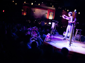 Ask Me Another host Ophira Eisenberg stirs up the audience during a live taping at the Bell House in Brooklyn, NY. Ask Me Another host Ophira Eisenberg stirs up the audience during a live taping at the Bell House in Brooklyn, NY.