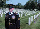 A U.S. Army honor guard stands at attention during a ceremony to mark Memorial Day, this week at Arlington National Cemetery.