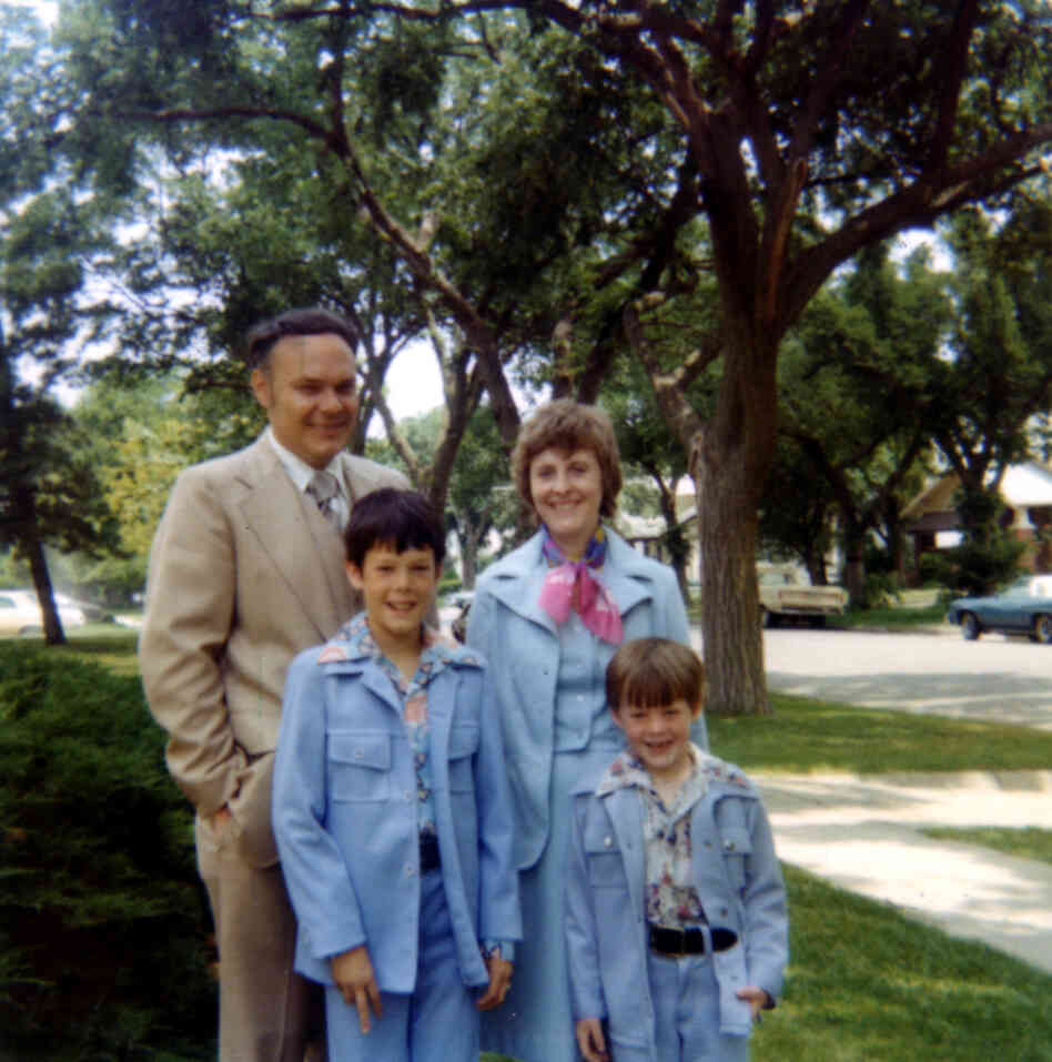 The Hilton family all dressed up, possibly for the John Denver show at Kemper Arena. Robin's the one in the light blue suit, with the lapels. The Hilton family all dressed up, possibly for the John Denver show at Kemper Arena. Robin's the one in the light blue suit, with the lapels.
