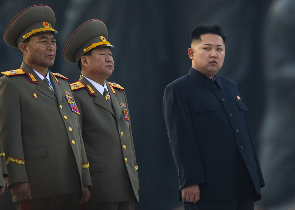 North Korean leader Kim Jong Un stands next to senior military leaders during a ceremony in honor of his father, Kim Jong Il and grandfather, Kim Il Sung in Pyongyang.