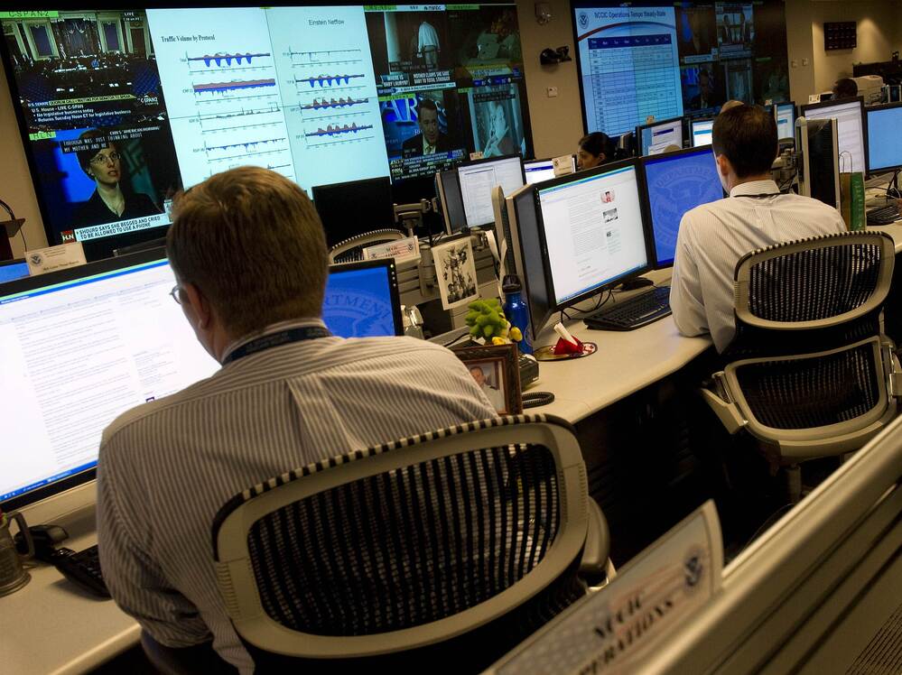 Homeland Security analysts watch for threats to U.S. technological infrastructure at the National Cybersecurity and Communications Integration Center.