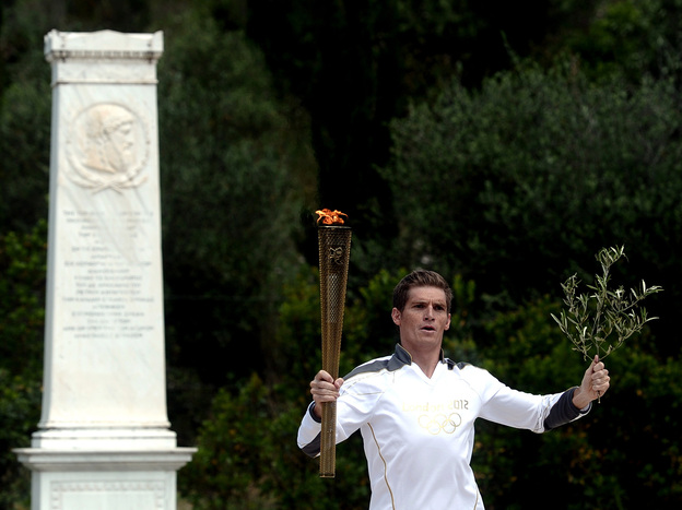 Spyros Gianniotis started the Olympic torch relay at the ancient site of Olympia earlier this month. Greece hasn't won an Olympic medal in swimming since 1896 — something Gianniotis hopes to change in London.