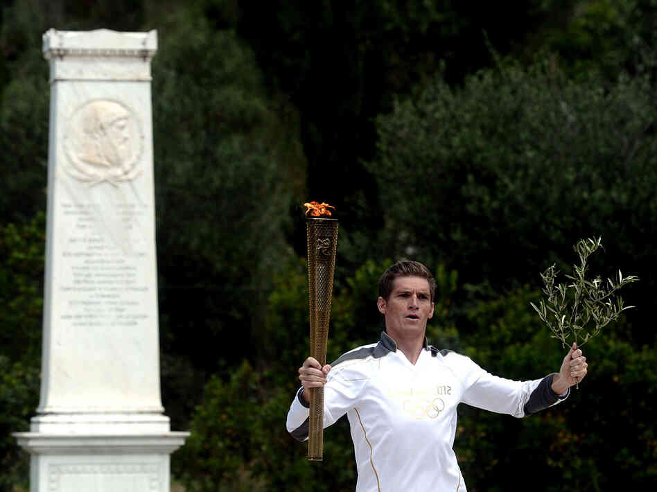 Spyros Gianniotis started the Olympic torch relay at the ancient site of Olympia earlier this month. Greece hasn't won an Olympic medal in swimming since 1896 — something Gianniotis hopes to change in London.