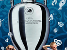 Larger Than Life: Tourists pose in front of a UEFA Euro 2012 Cup placard on Kiev's Independence Square in Ukraine. Europe is entering a packed sports schedule — but soccer still reigns supreme, says Frank Deford. Larger Than Life: Tourists pose in front of a UEFA Euro 2012 Cup placard on Kiev's Independence Square in Ukraine. Europe is entering a packed sports schedule — but soccer still reigns supreme, says Frank Deford.