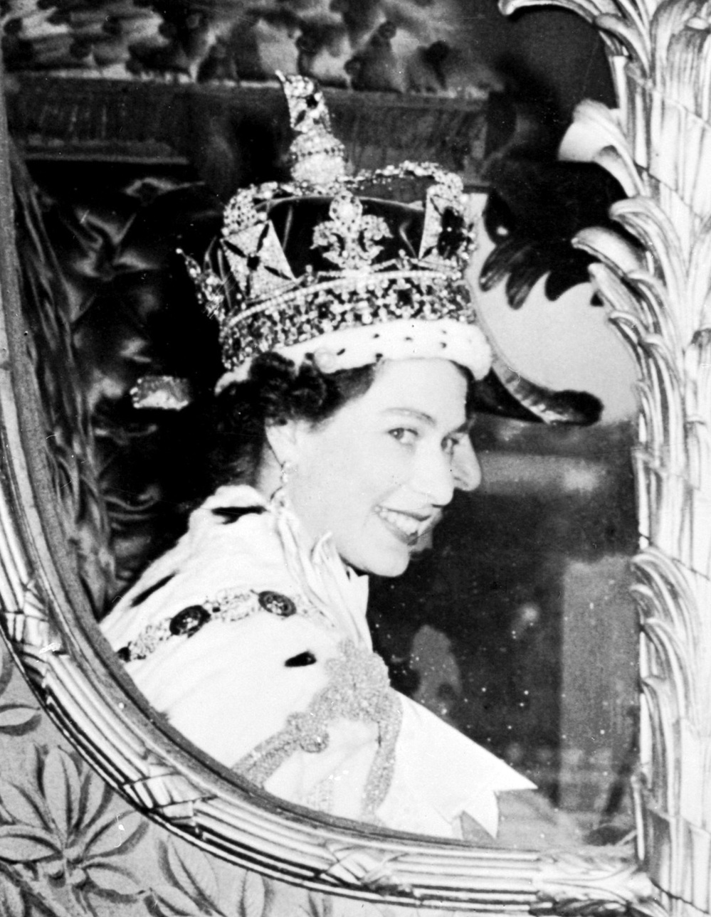 Queen Elizabeth II is seen after being crowned at Westminster Abbey in London on June 2, 1953. Elizabeth was proclaimed queen in 1952 at age 25.