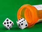 Dice tumbling out of a prescription drug bottle. Dice tumbling out of a prescription drug bottle.