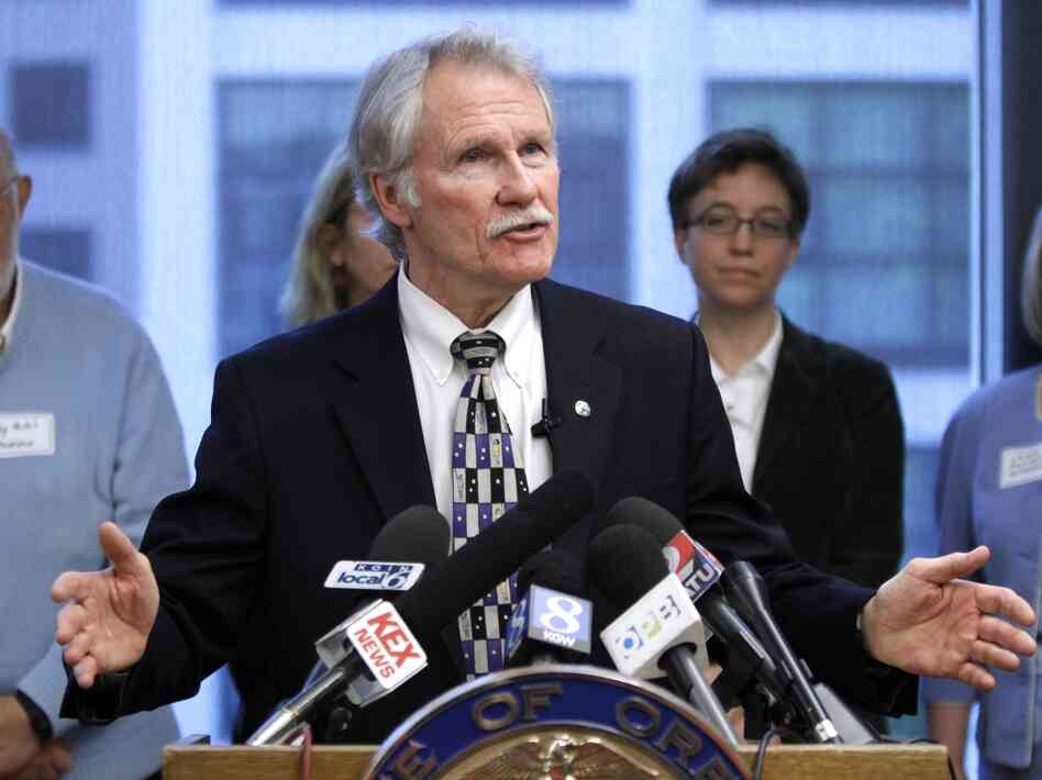 Oregon Gov. John Kitzhaber is leading a $2 billion health care experiment in the state, aimed at changing the way the sickest people in Oregon get health care. Here, he speaks during a press conference in Portland earlier this month.