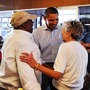 President Obama greets diners at Reid's House Restaurant in Reidsville, N.C., last fall. While there, he talked to a college student about the importance of education — one of the ideas Obama comes back to often.