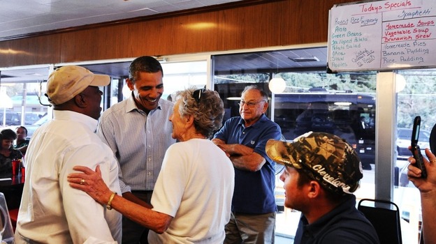 President Obama greets diners at Reid's House Restaurant in Reidsville, N.C., last fall. While there, he talked to a college student about the importance of education — one of the ideas Obama comes back to often. President Obama greets diners at Reid's House Restaurant in Reidsville, N.C., last fall. While there, he talked to a college student about the importance of education — one of the ideas Obama comes back to often.