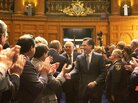 Mitt Romney shakes hands as he walks into the House Chambers during inaugural ceremonies at the State House in Boston in 2003. the Obama campaign sought to focus attention on Romney's tenure as Massachusetts governor. Mitt Romney shakes hands as he walks into the House Chambers during inaugural ceremonies at the State House in Boston in 2003. the Obama campaign sought to focus attention on Romney's tenure as Massachusetts governor.