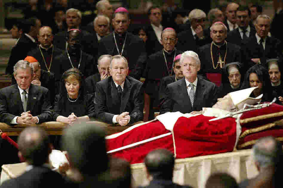 Former presidents often gather for significant events, such as funerals of heads of state and other major figures. Here, President George W. Bush, his wife Laura, former President George H.W. Bush, former President Bill Clinton, and Secretary of State Condoleezza Rice kneel by the body of Pope John Paul II inside St. Peter's Basilica, at the Vatican, on April 6, 2005.