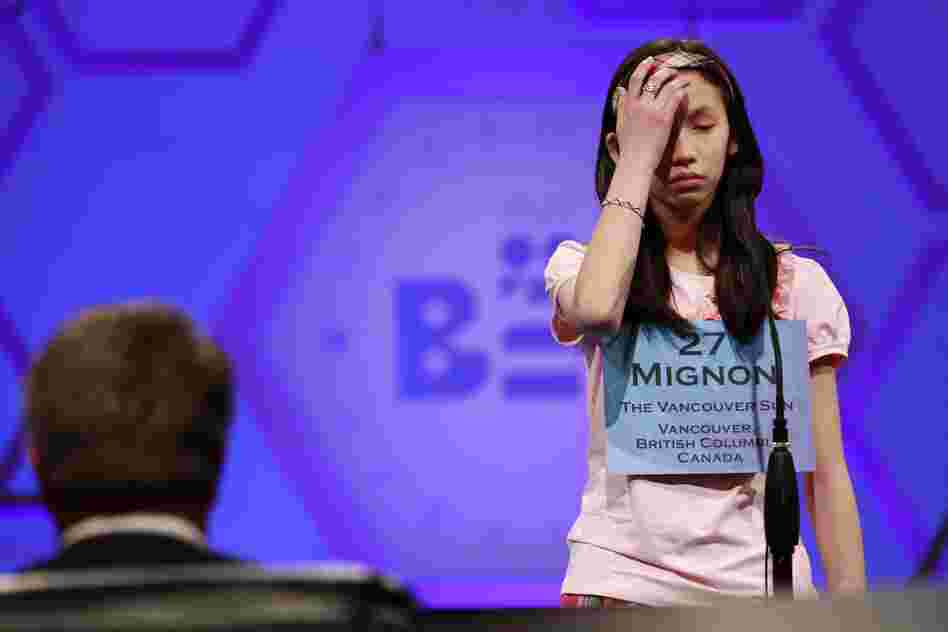 Mignon Tsai, 12, of Abbotsford, British Columbia, Canada, reacts as she misspells a word during Round 5 of the semifinals on Thursday.