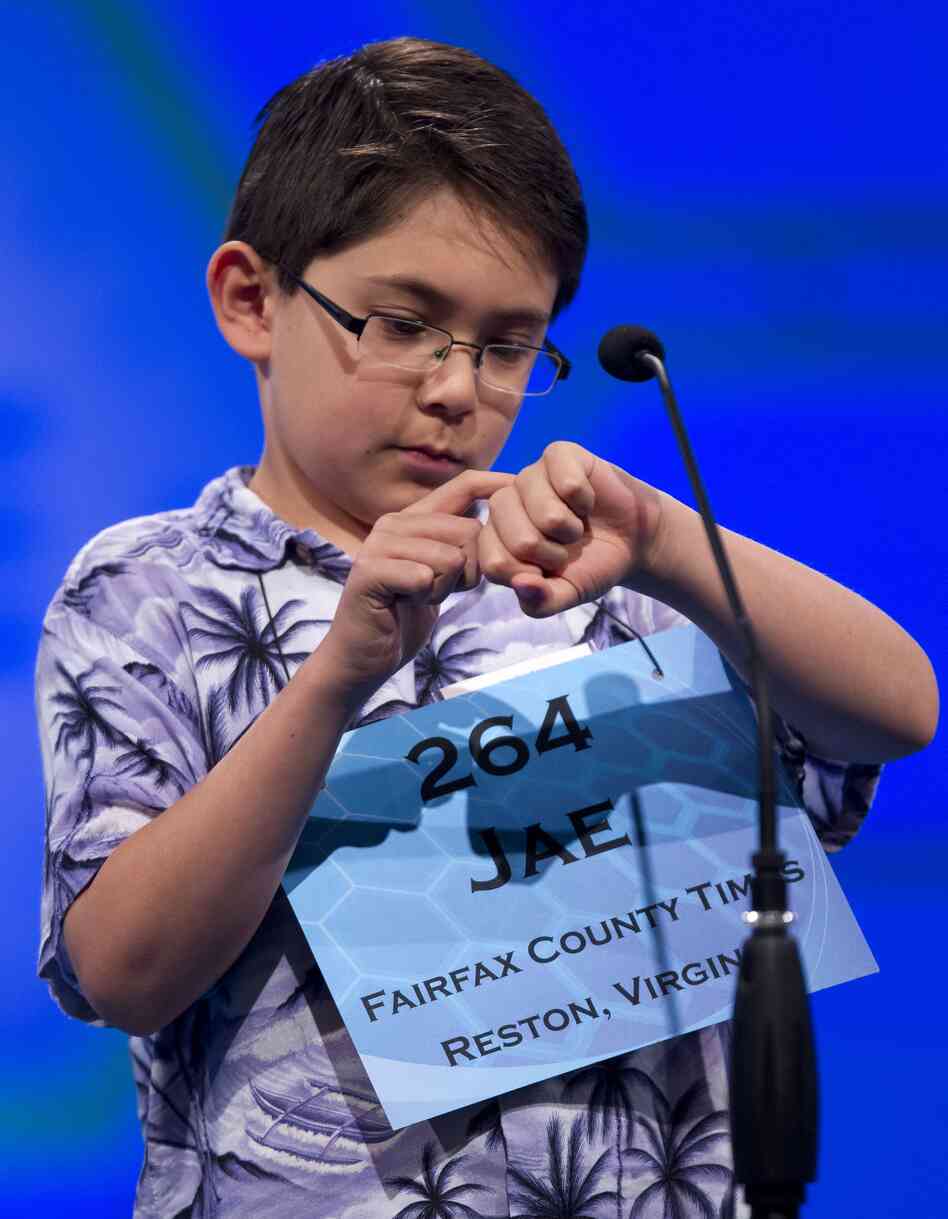 Jae Canetti of Fairfax, Va., concentrates on his word "habendum" during the semifinal round on Thursday.