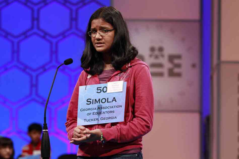 Despite looking nervous, Simola Nayak, 13, of DeKalb County, Ga., spells a word correctly in Round 5 of the semifinals on Thursday.