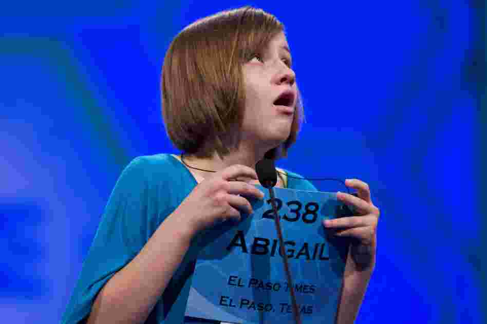 Abigail Violet Spitzer of El Paso, Texas, reacts after spelling her word "tondino" correctly during Thursday's semifinal round.