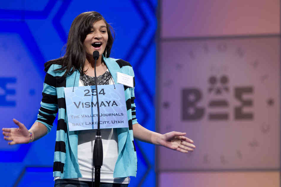 Vismaya Kharkar, 13, of Bountiful, Utah, is jubilant after spelling "allothogenic" correctly. 
