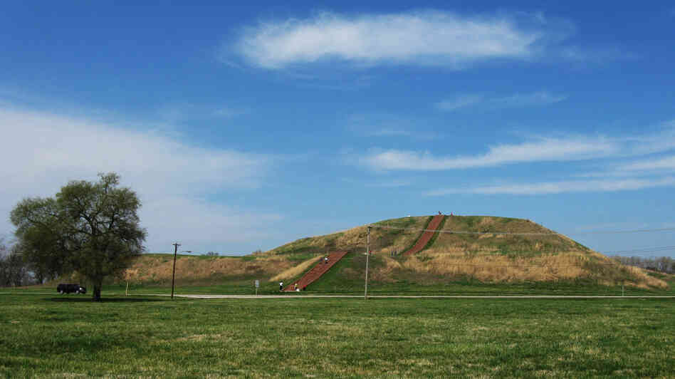 Rising 100 feet above the ground, Monks Mound is the tallest of the 80 or so mounds remaining at the Cahokia Mounds State Historic Site in Illinois. Around 900 years ago, it was a carefully maintained earthen pyramid, supporting a large wooden temple that would have been several stories high. Cahokia's leader may have lived here. Rising 100 feet above the ground, Monks Mound is the tallest of the 80 or so mounds remaining at the Cahokia Mounds State Historic Site in Illinois. Around 900 years ago, it was a carefully maintained earthen pyramid, supporting a large wooden temple that would have been several stories high. Cahokia's leader may have lived here.