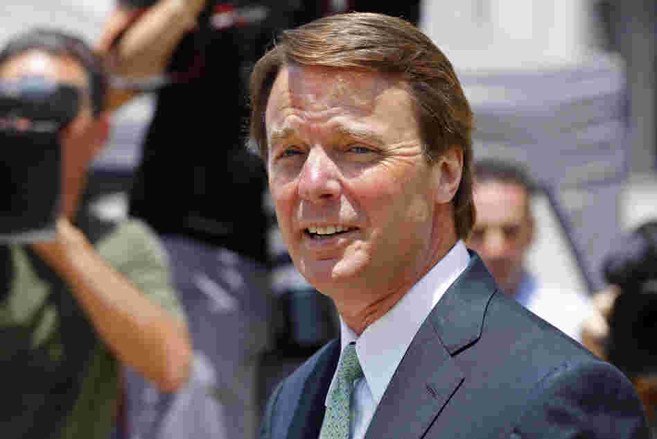 John Edwards leaves a federal courthouse during the ninth day of jury deliberations in his trial on charges of campaign corruption in Greensboro, N.C., on Thursday.