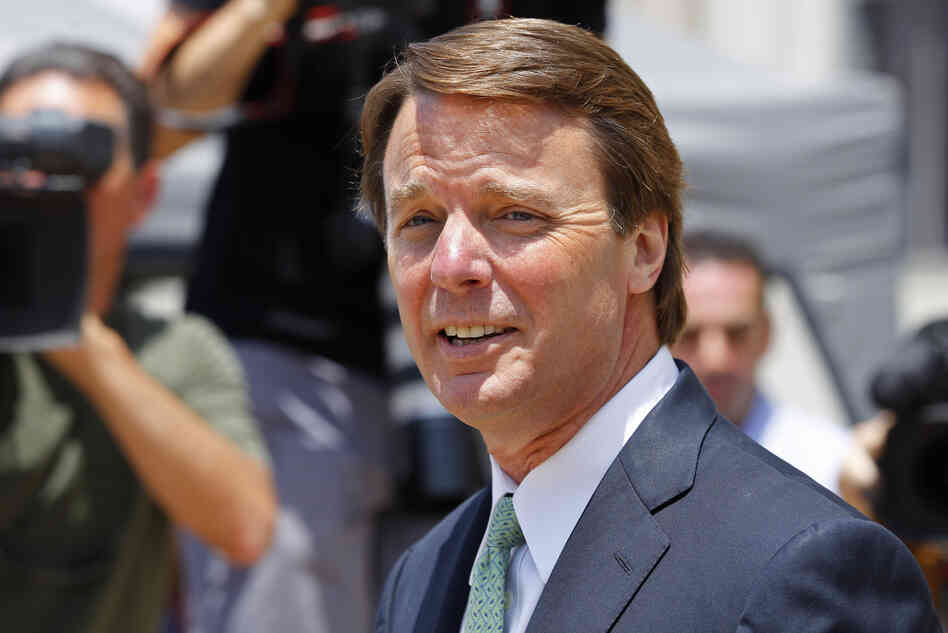 John Edwards leaves a federal courthouse during the ninth day of jury deliberations in his trial on charges of campaign corruption in Greensboro, N.C., on Thursday.