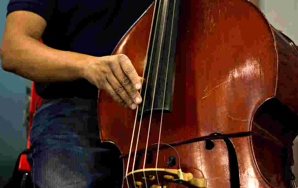 Stanley Clarke is known primarily as an electric bassist, but picked up an upright bass for this session.