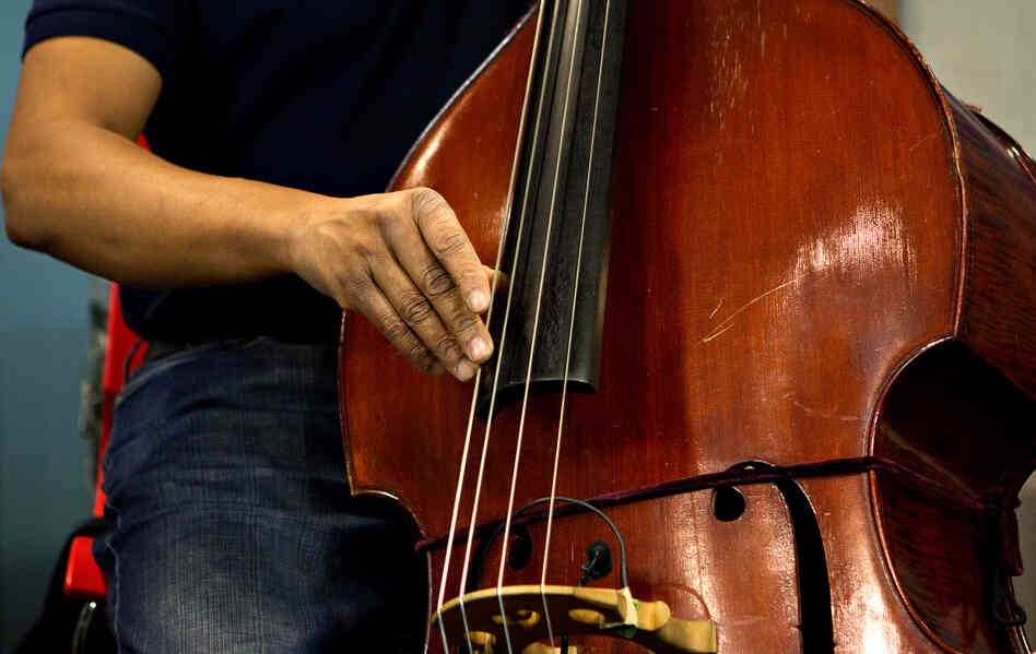Stanley Clarke is known primarily as an electric bassist, but picked up an upright bass for this session.